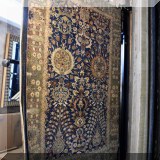 R05. Hand knotted rug from India. 6' x 8'9”